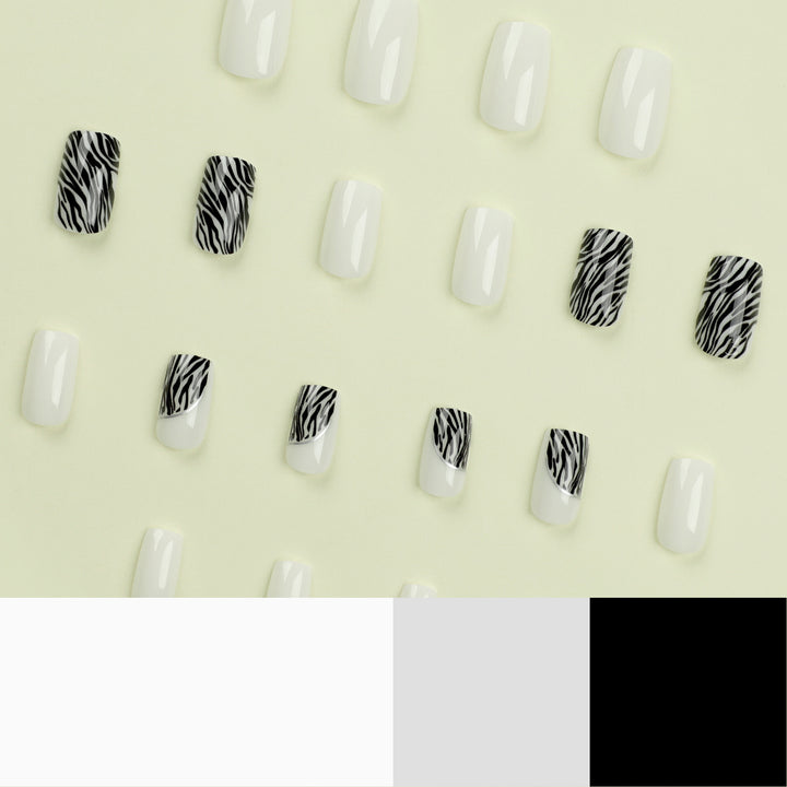 Artful nail extensions with stylish zebra pattern Kalsten