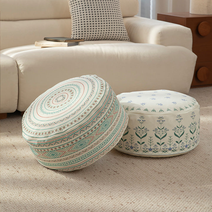 Round floor pouf with ethnic weaving pattern and practical carrying handle Kalsten
