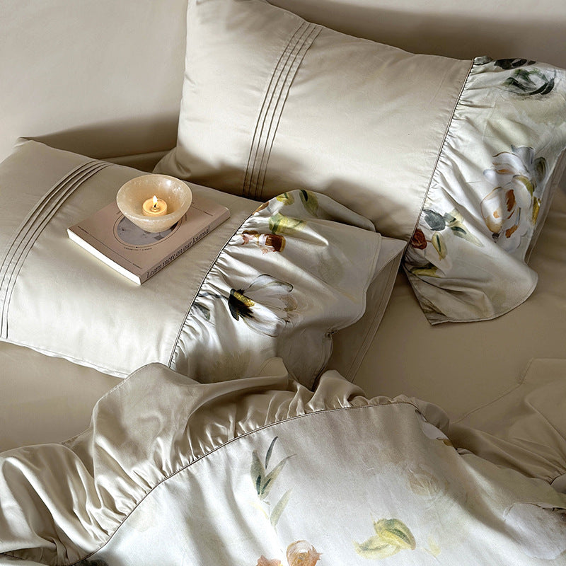 Bedding set made of silky cotton satin with floral watercolor illustration and ruffle
