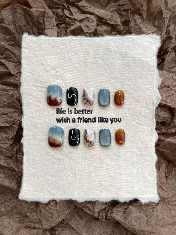 Artistic Press-On Nail Set with Stunning Marble Effect