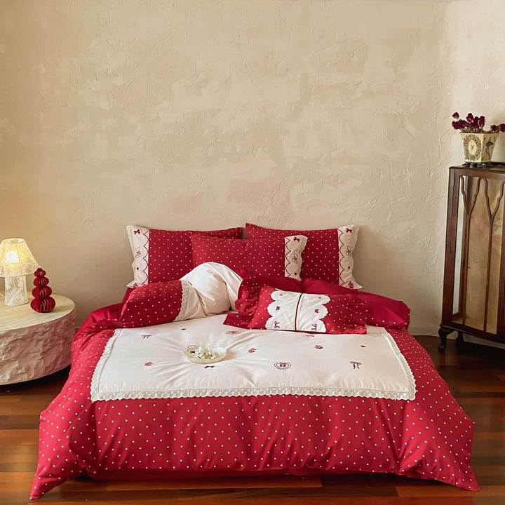 Country house style bedding set with polka dot design, decorative trim and pillowcase set