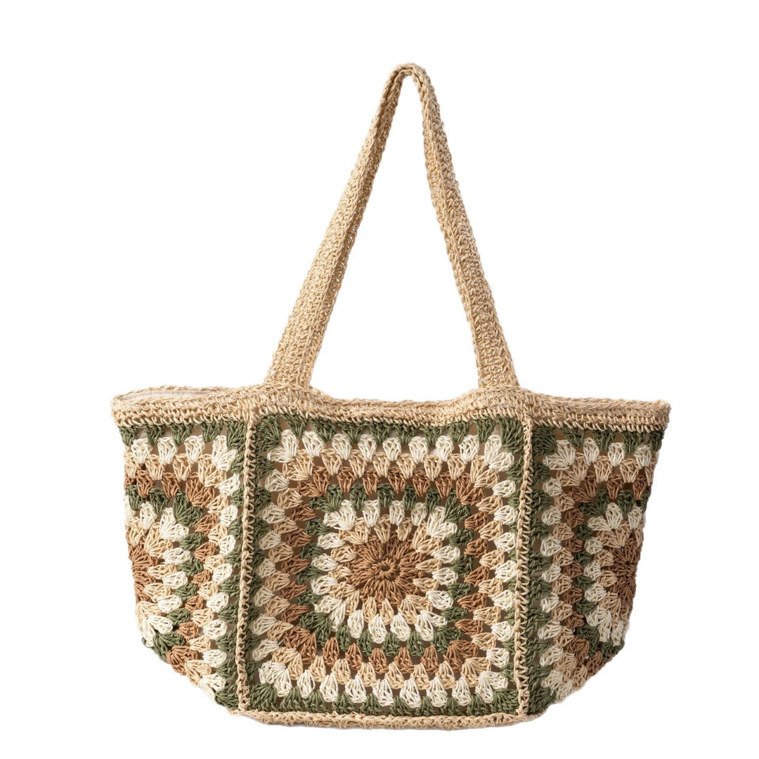 Beach bag made of hand-woven natural material with a square pattern Kalsten