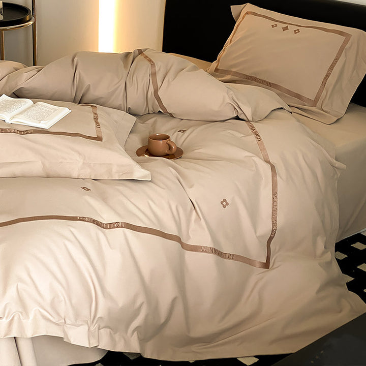 Luxurious cotton satin bedding set with embroidered border edge