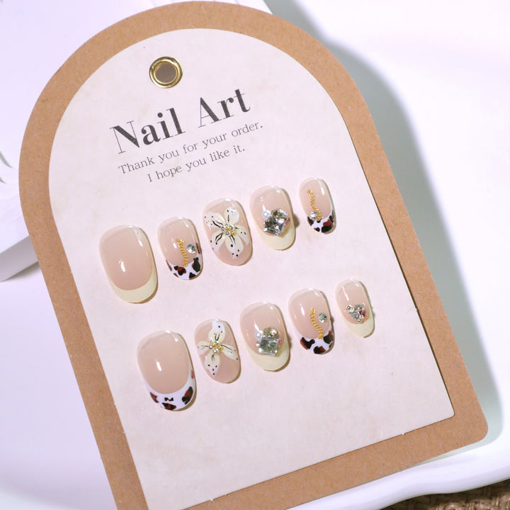 Exclusive nail art with floral design and glitter accents Kalsten