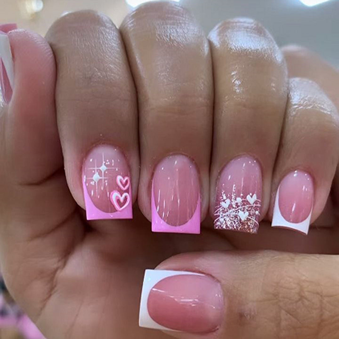 Artful Nail Art with Heart and Glitter Motifs Kalsten