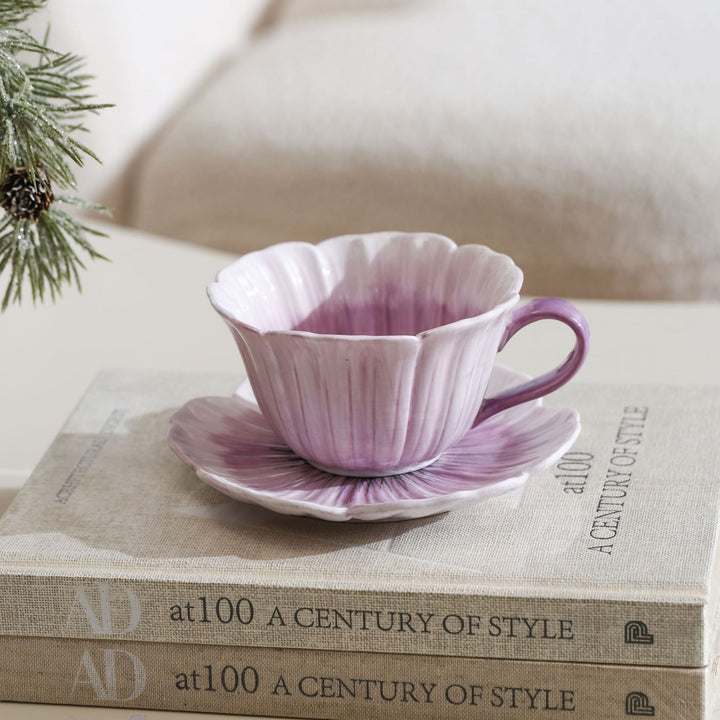Ceramic mug with saucer in flower shape