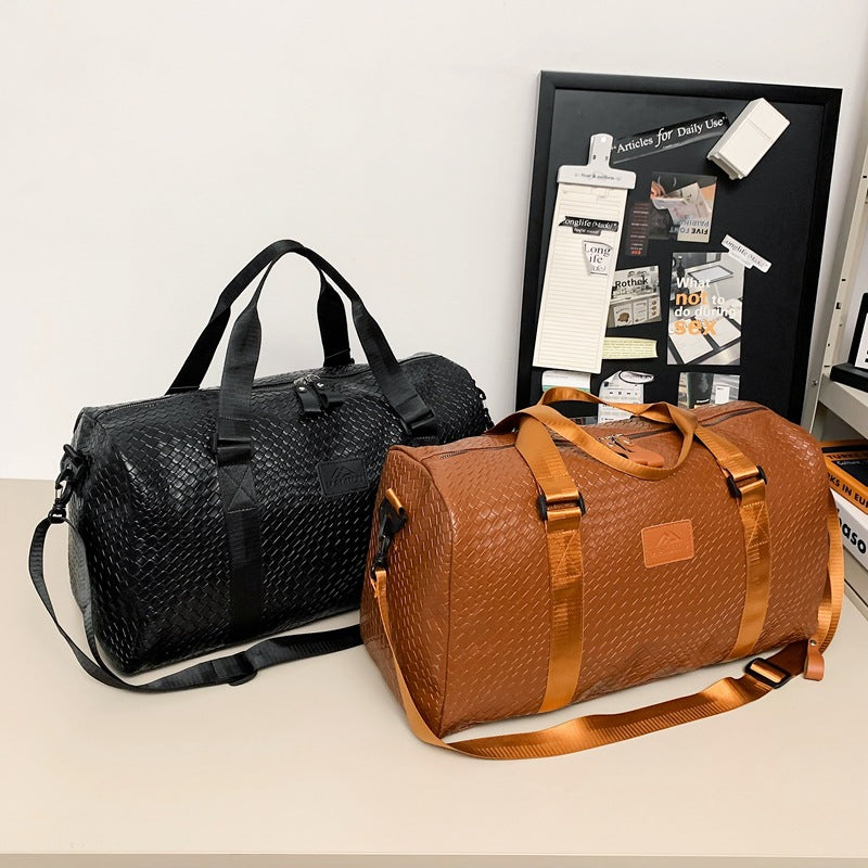 Elegant Woven Leather Duffle Bag