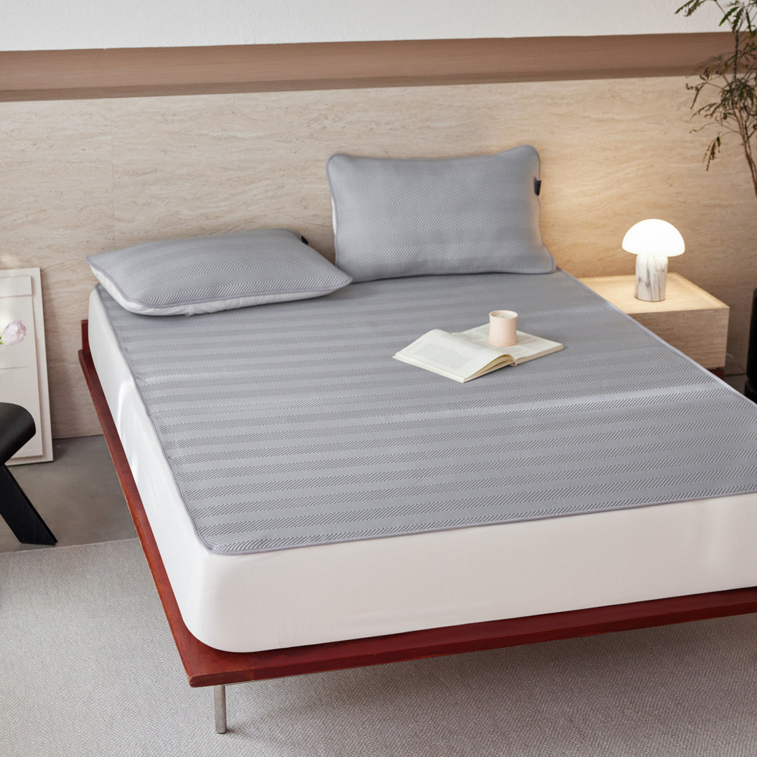 Breathable mattress topper with non-slip bottom and moisture-regulating structure