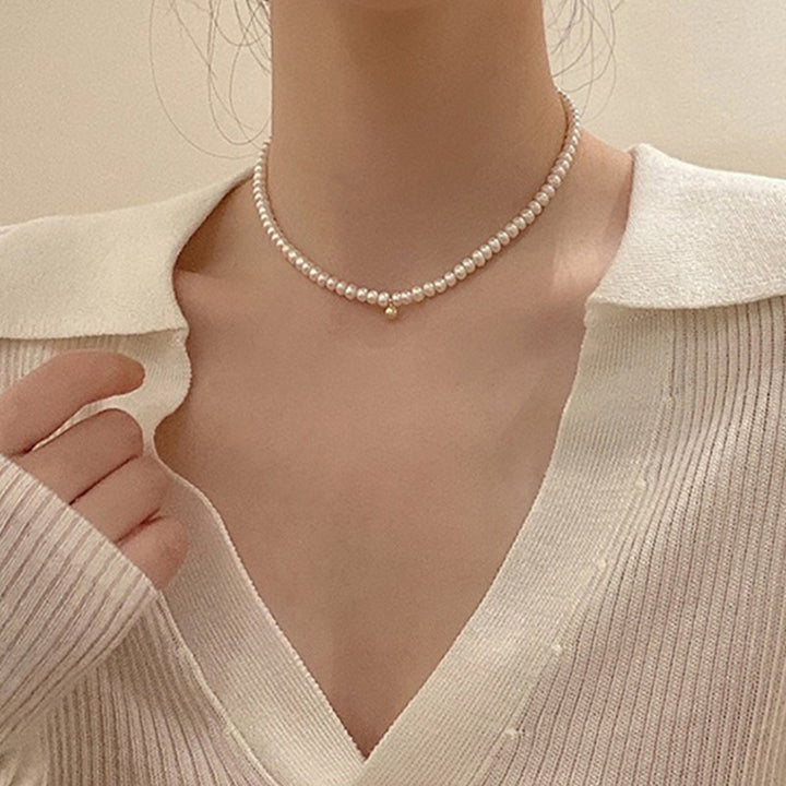 Delicate pearl necklace with elegant gold accent chain Kalsten