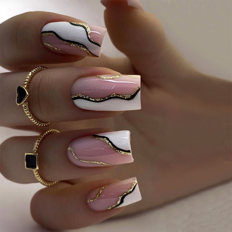 Artistic Press-On Nails with Elegant Gold Accent Kalsten