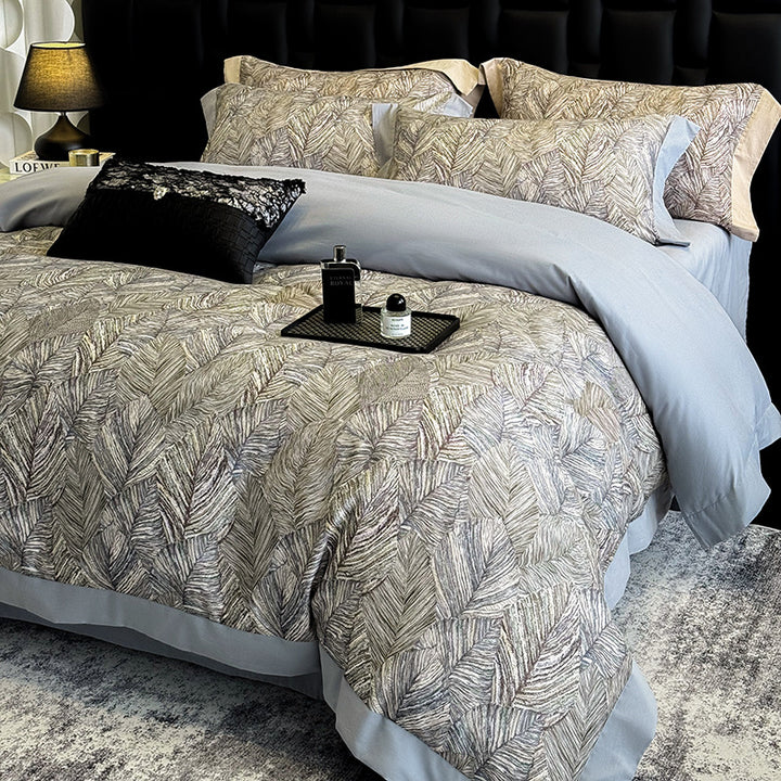 Elegant bed linen set made of cotton satin with a subtle leaf pattern and contrast piping