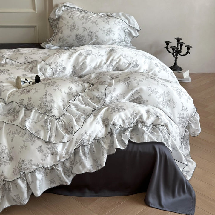 Elegant satin bedding set with ruffled edge and Toile-de-Jouy motif