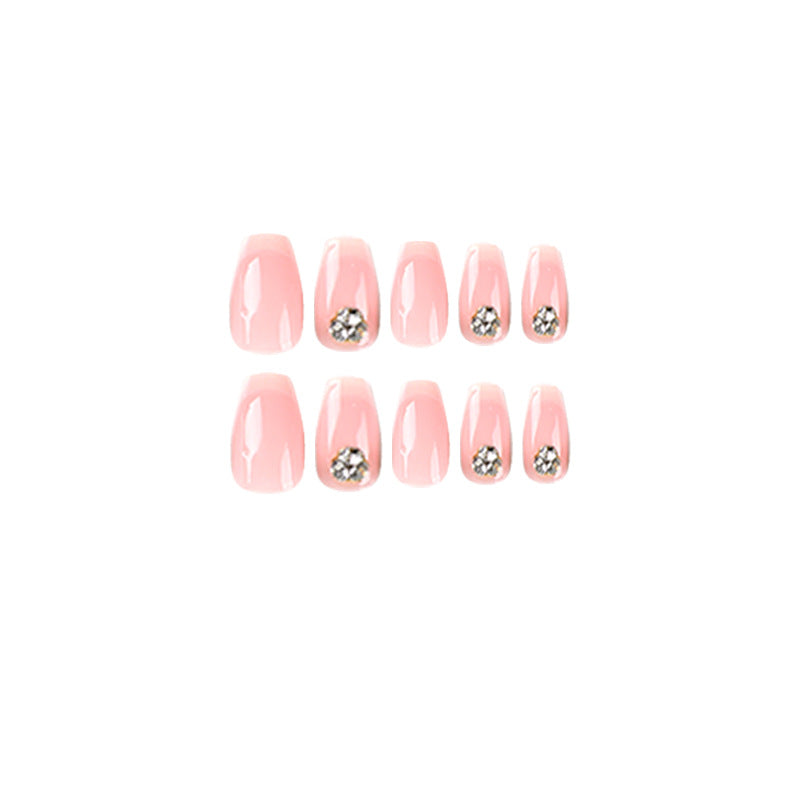 Artful nail extensions with elegant French tip and rhinestone embellishments Kalsten