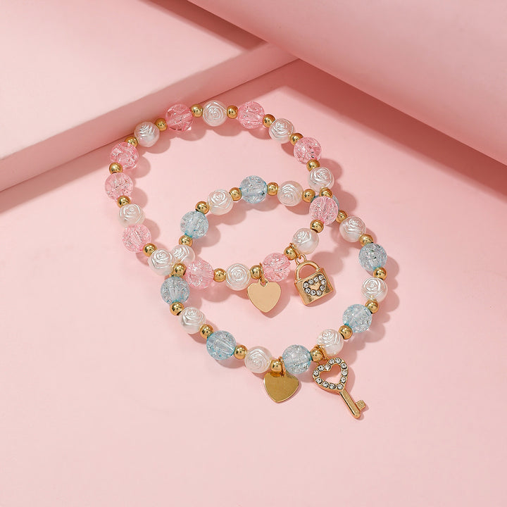Playful bracelet set with heart and key design Kalsten
