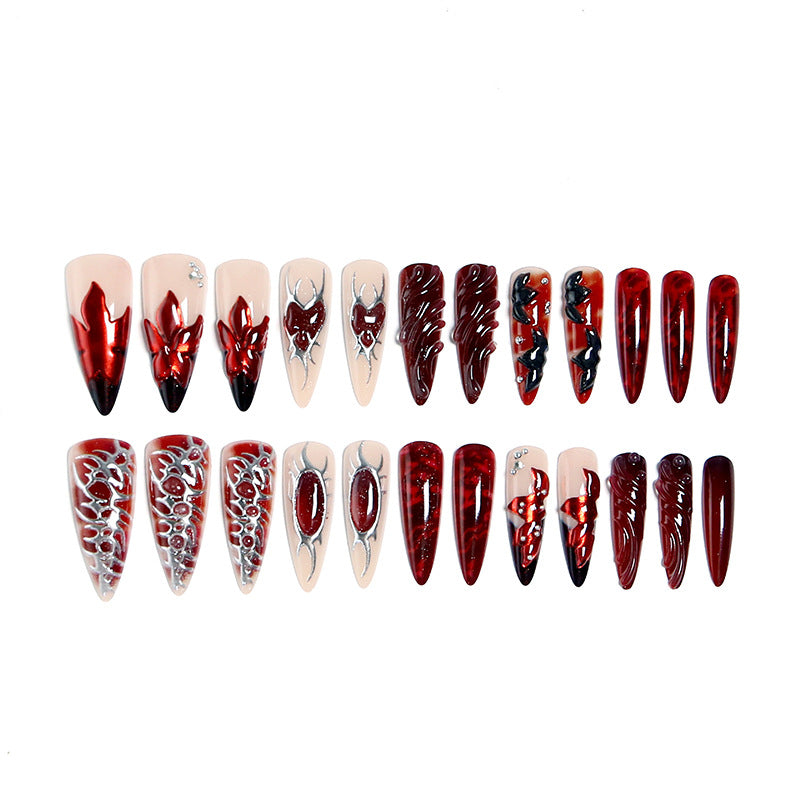 Artificial nail set with extravagant red and black designs Kalsten