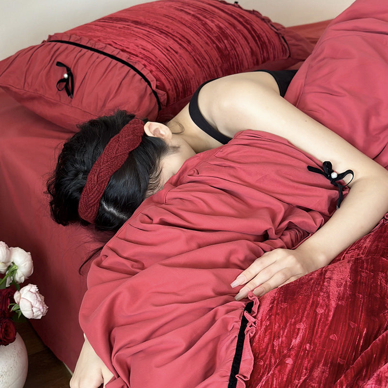 Bedding set made of velvety microfiber with ruffles, decorative ribbons, and quilted texture
