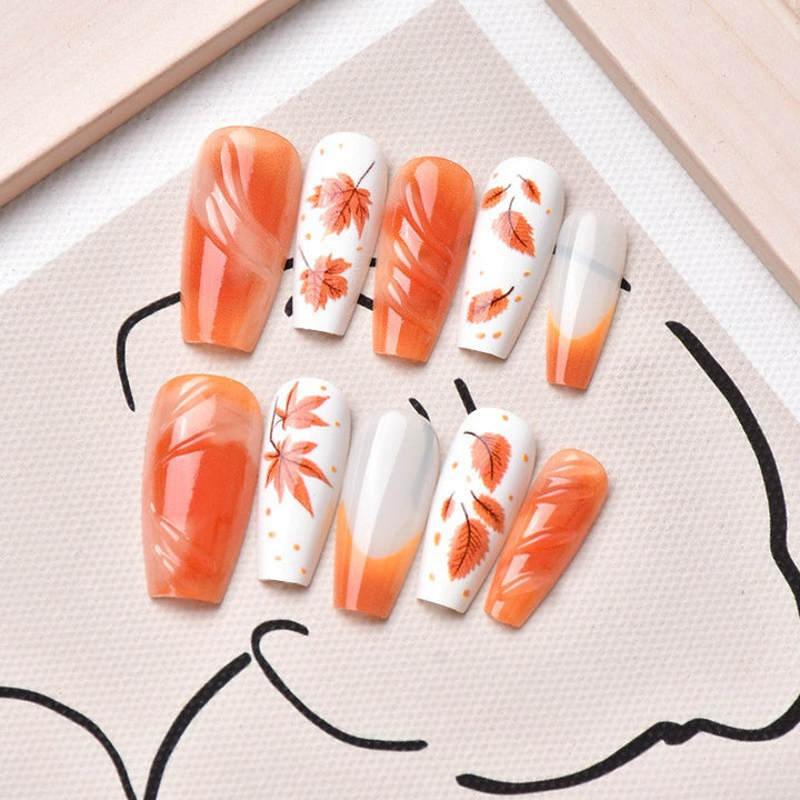 Acrylic nail set with elegant autumn motifs and shiny accents Kalsten