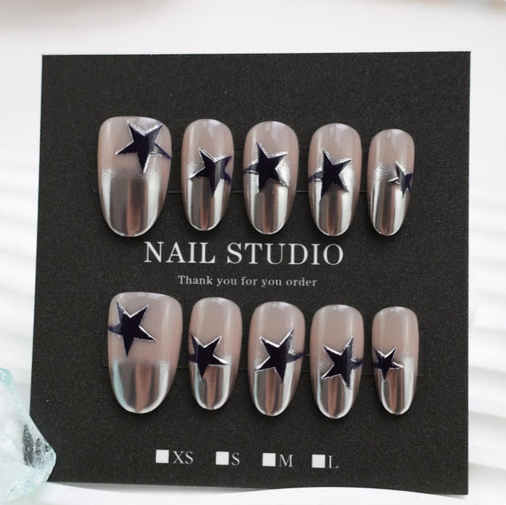 Art nail set with stylish star motifs Kalsten