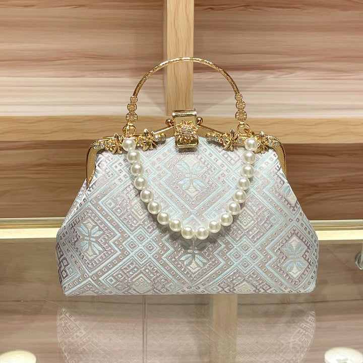 Elegant Pearl-Embellished Handbag
