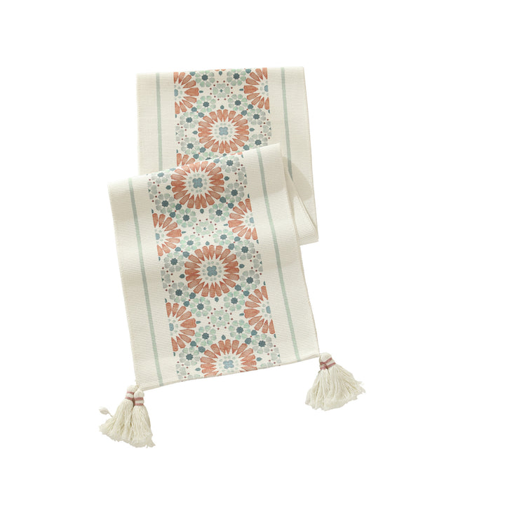 Web table runner made of cotton blend with woven diamond design and tassels