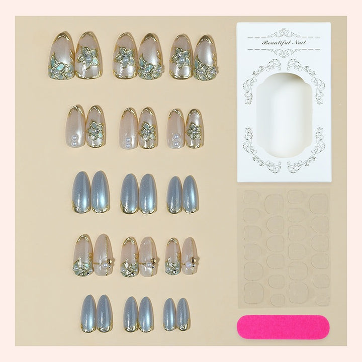 Glamorous artificial nails with floral designs Kalsten