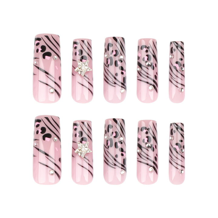 Artful Nail Art with Zebra Pattern and Glitter Accents Kalsten