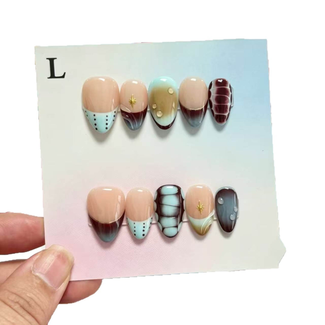 Artistic Press-On Nail Set with Unique Decorative Elements