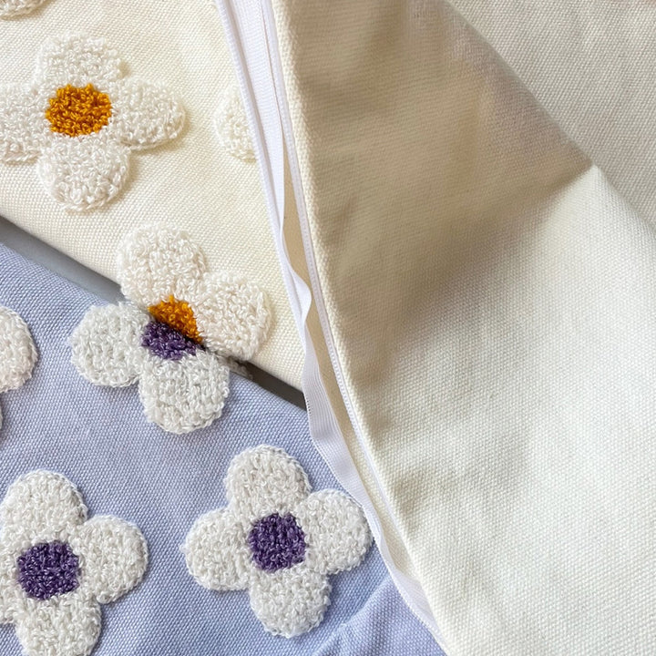 Square decorative cushion cover with hand-tufted flower relief and bouclé applications Kalsten