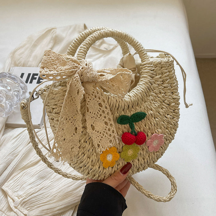 Handcrafted Floral Accent Straw Handbag