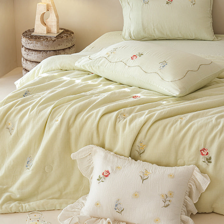 Light cotton gauze bedding set with fine floral embroidery and ruffle trim