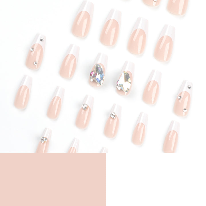 Artistic nail art with glitter accents and rhinestone embellishments Kalsten
