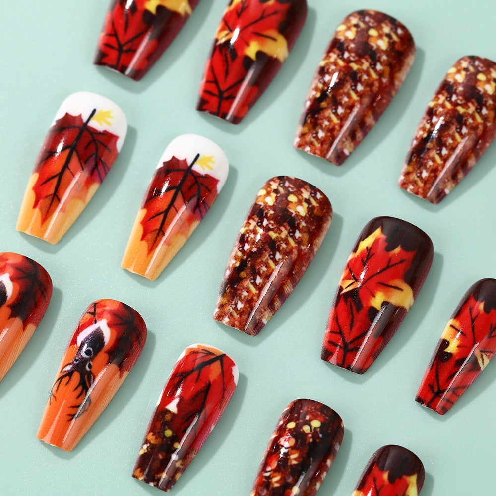Artificial nails in autumn leaf design Kalsten