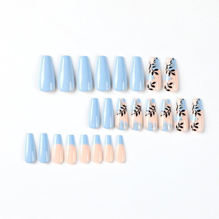 Artful Nail Art with Floral Designs and Glitter Kalsten