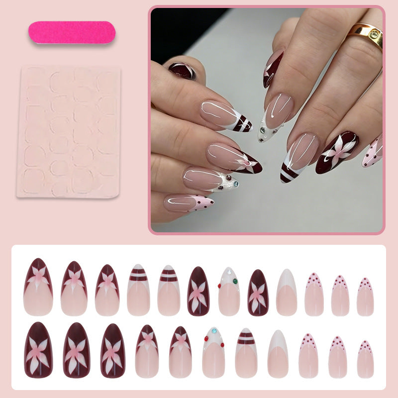 Artificial nail set with floral design and glitter accents Kalsten