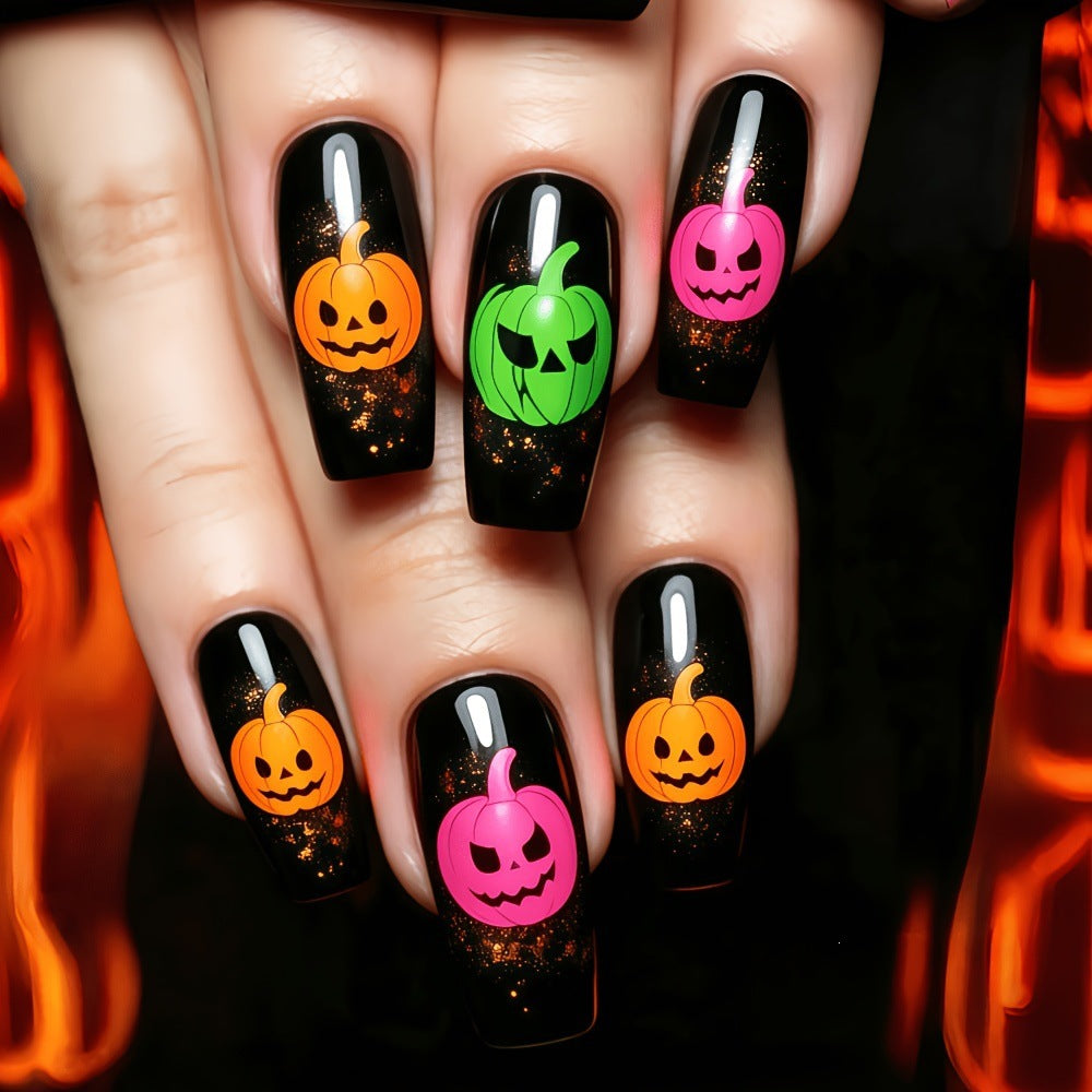 Halloween-style artificial nails with graphic pumpkin designs Kalsten
