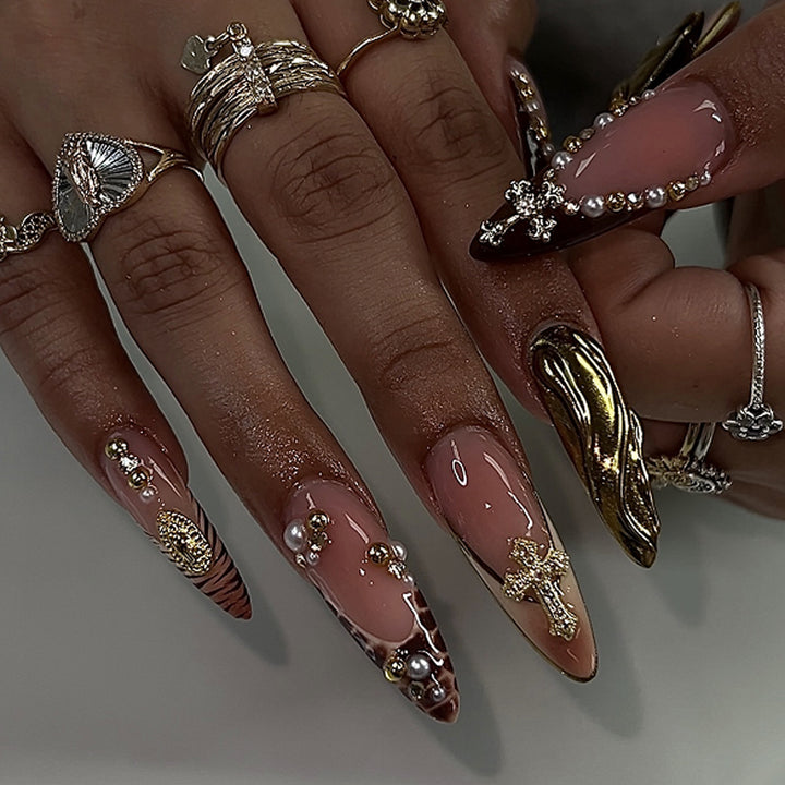 Artful acrylic nails with glitter and rhinestone decorations Kalsten