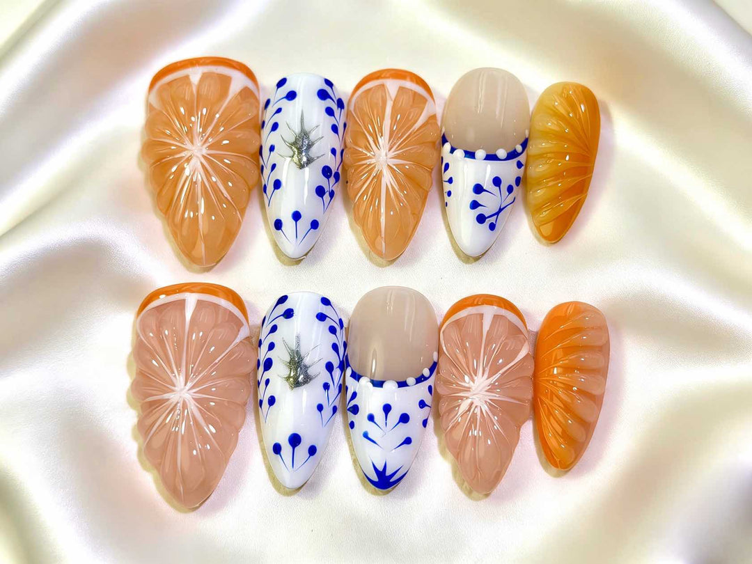 Artistic Press-On Nail Set Featuring Citrus Patterns