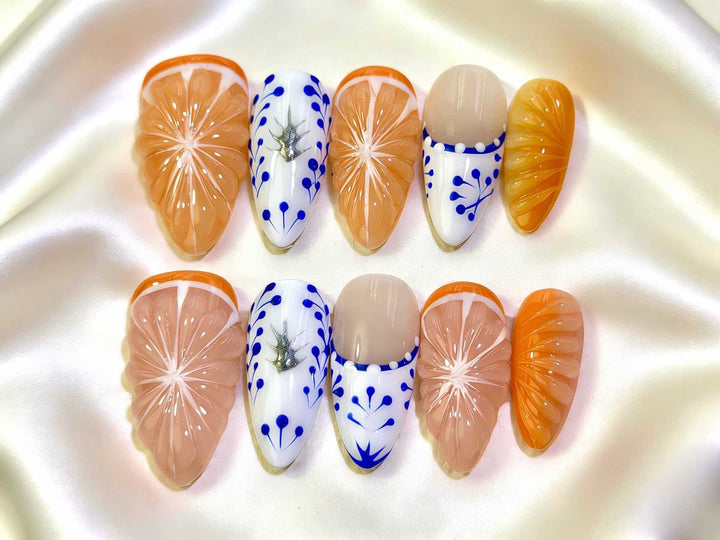 Artistic Press-On Nail Set Featuring Citrus Patterns
