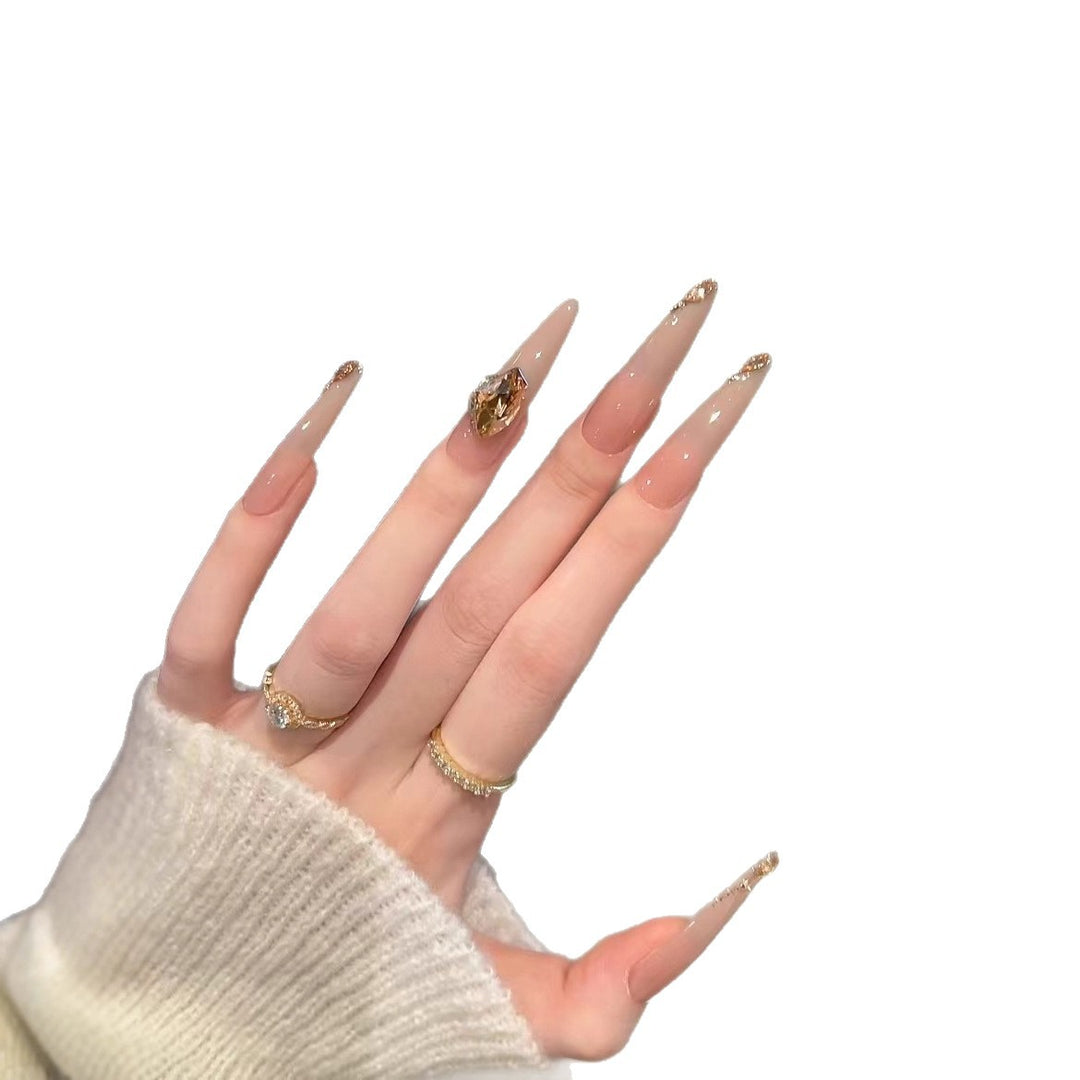 Artistic Stiletto Nail Art Extensions with Gemstone Accents