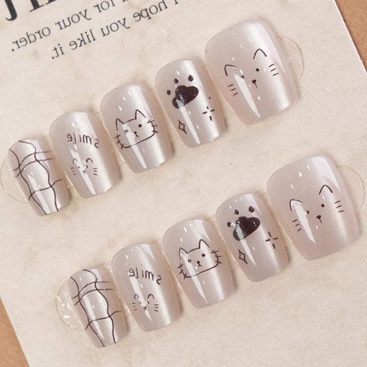 Whimsical Cat-Themed Press-On Nail Art Kalsten