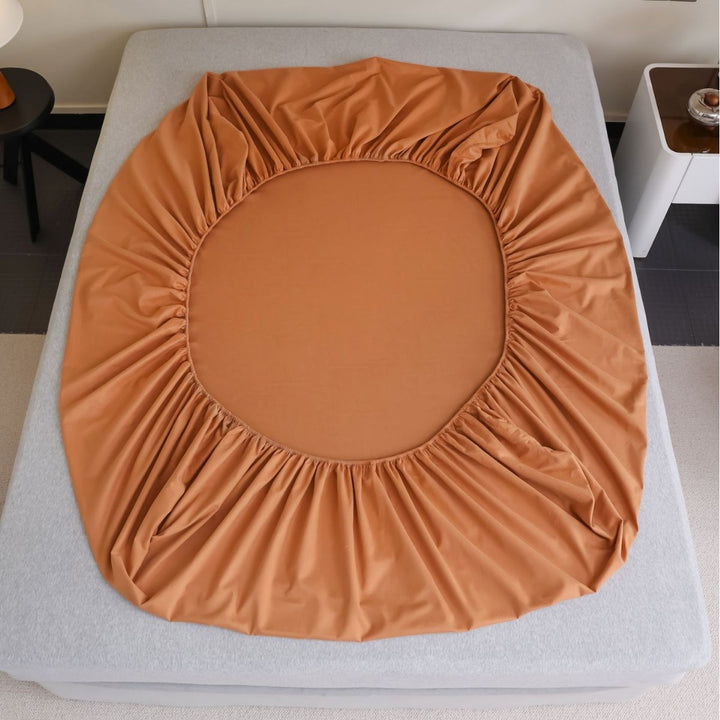Fitted sheet made of cotton jersey with extra deep hem and elastic all-around rubber