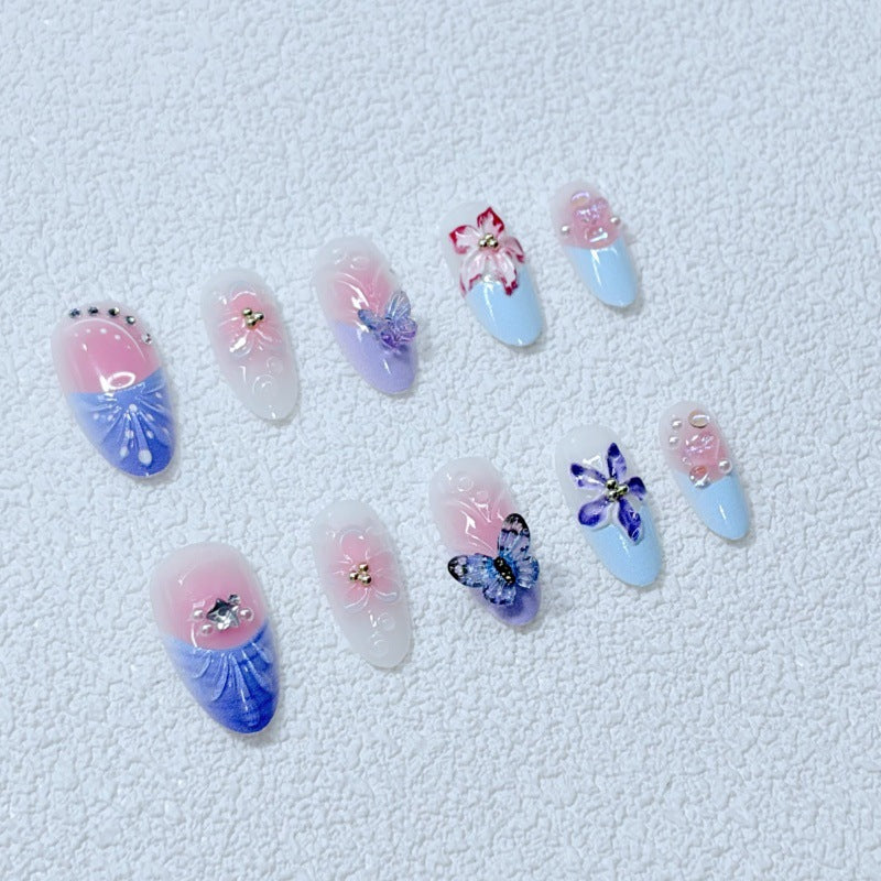Artful Nail Art with Floral Details and Butterflies Kalsten