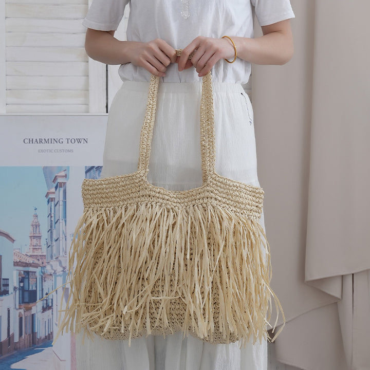 Trendy raffia bag with fringed details Kalsten