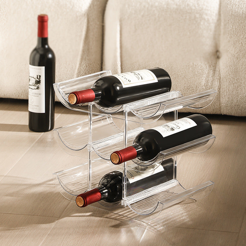 Stackable acrylic wine bottle holder with curved cavities for nine standard bottles