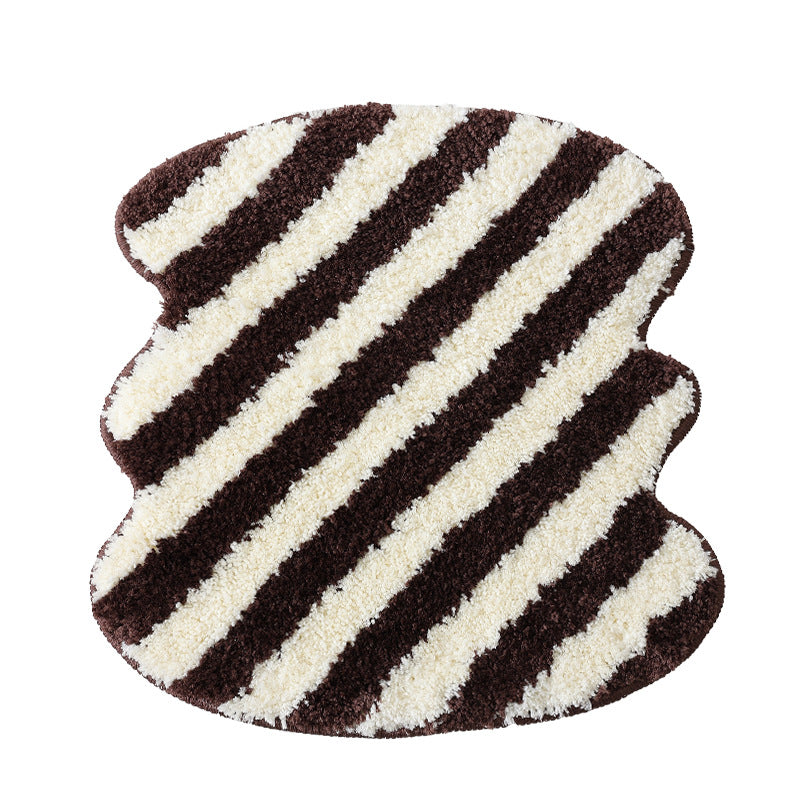Shaped high pile bath mat with diagonal stripe structure
