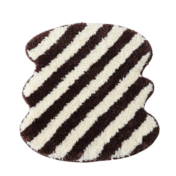 Shaped high pile bath mat with diagonal stripe structure