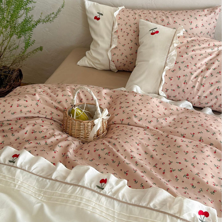Bedding set in cottage style with cherry embroidery, ruffle and micro print