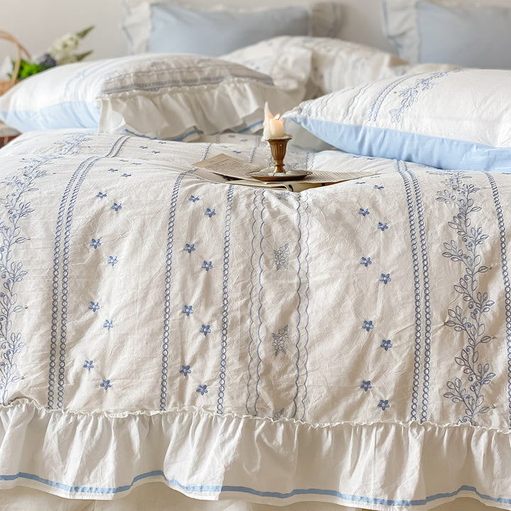 Country house bed set made of cotton with embroidery detail, ruffled edge and integrated bed skirt