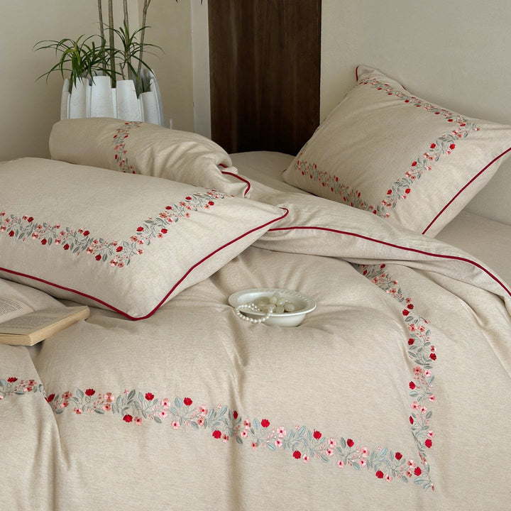 High-quality cotton-linen bed linen set with fine floral embroidery and piping edge