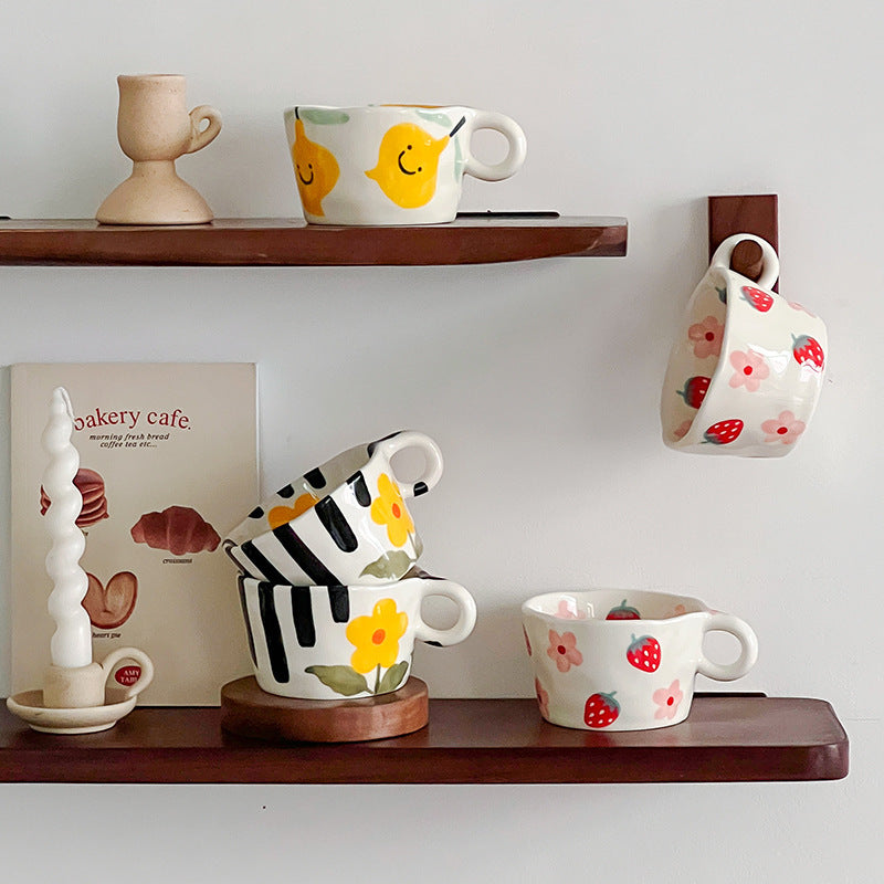 Ceramic mug with hand-painted penguin pattern